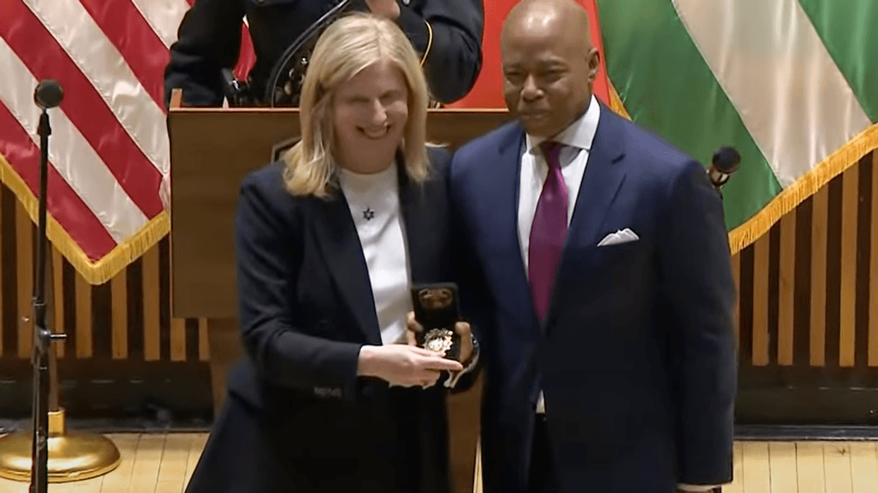 Jessica Tisch poses with Mayor Eric Adams as she is sworn in as the next Commissioner of the New York Police Department (NYPD) at One Police Plaza on November 25, 2024