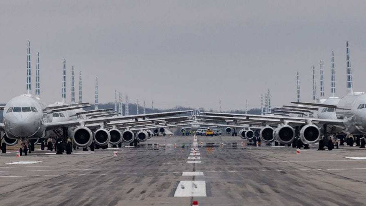 Jets are parked on a runway at the Pittsburgh International Airport in Pittsburgh, Pennsylvania. Due to decreased flights as a result of the coronavirus (COVID-19) pandemic, planes are being stacked and parked at the airport.