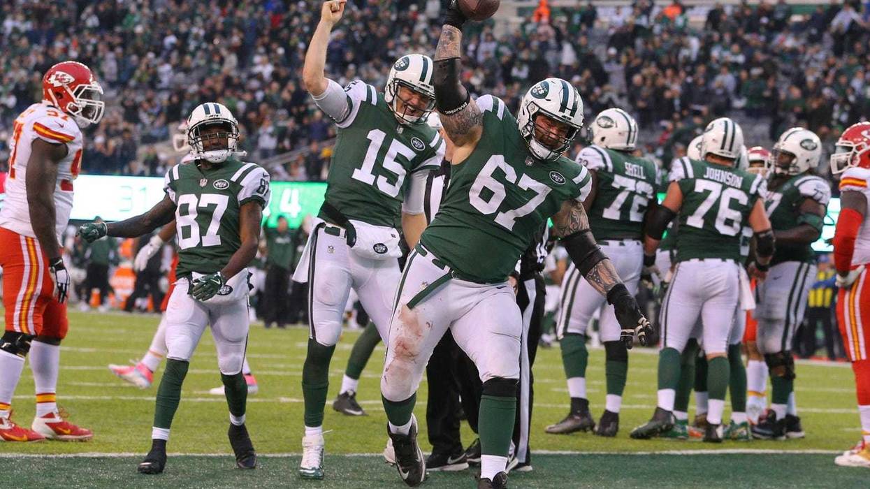 Jets OG Brian Winters (67) spikes the ball after McCown scored a touchdown against the Kansas City Chiefs in 2017.