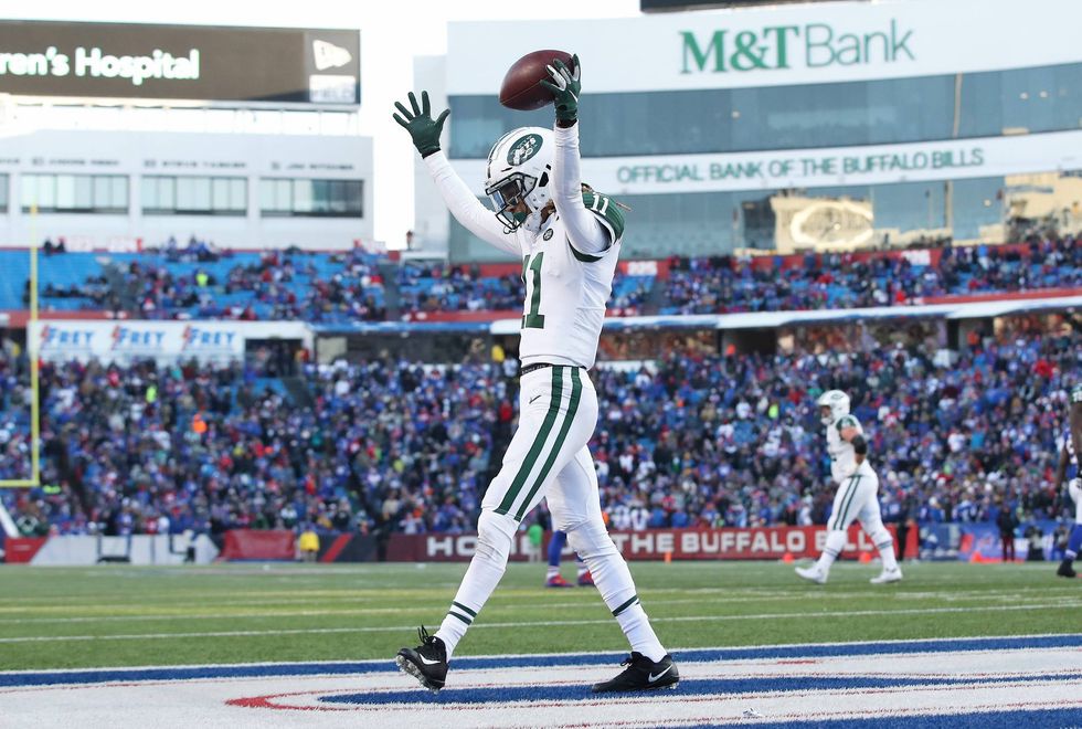 Jets receiver Robby Anderson celebrates a touchdown