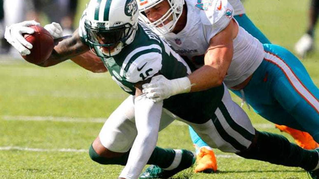 Jets wide receiver Terrelle Pryor is tackled after a catch by Dolphins linebacker Kiko Alonso on Sept. 16, 2018, at MetLife Stadium.
