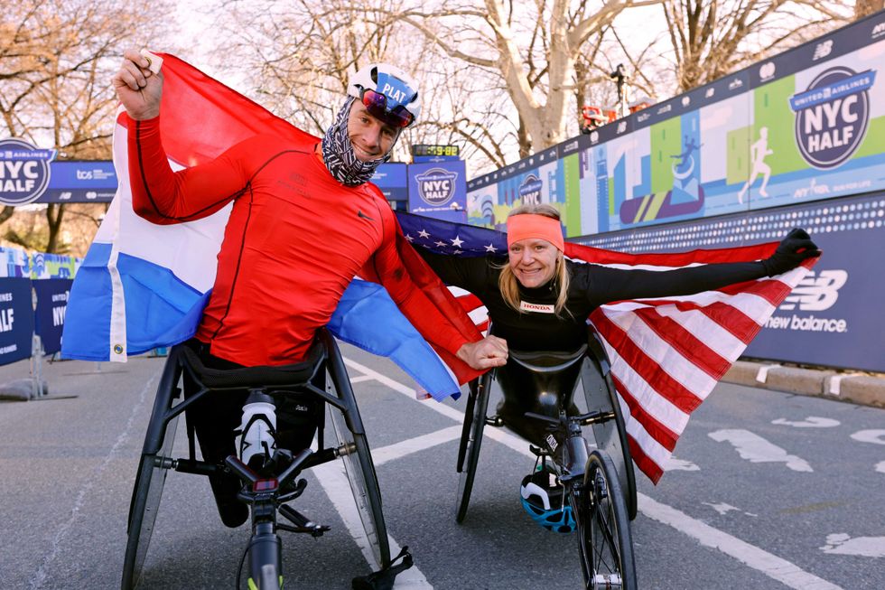 Jetze Plat of the Netherlands and Susannah Scaroni of the United States celebrate after winning the Men