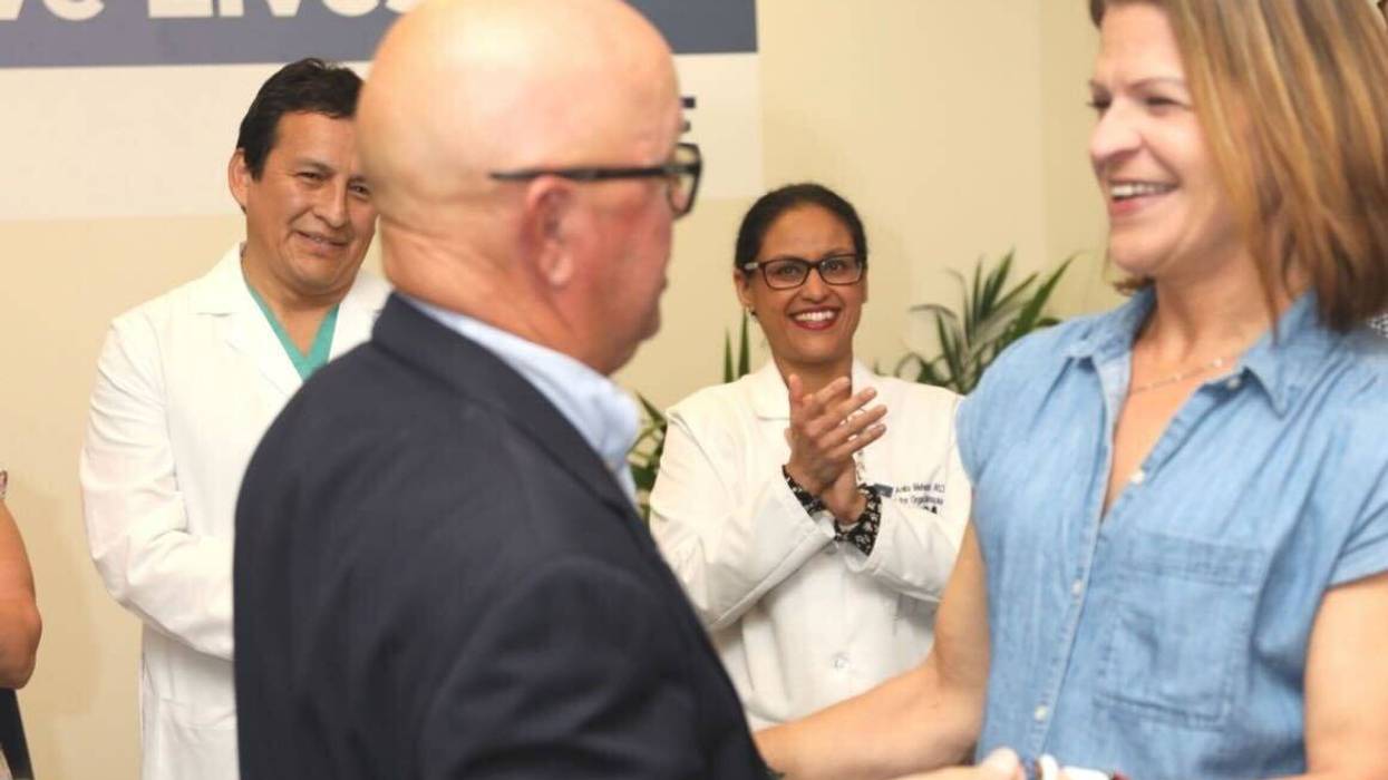 Jill Pinkelman meets the recipient of her donated kidney in Camden, N.J.