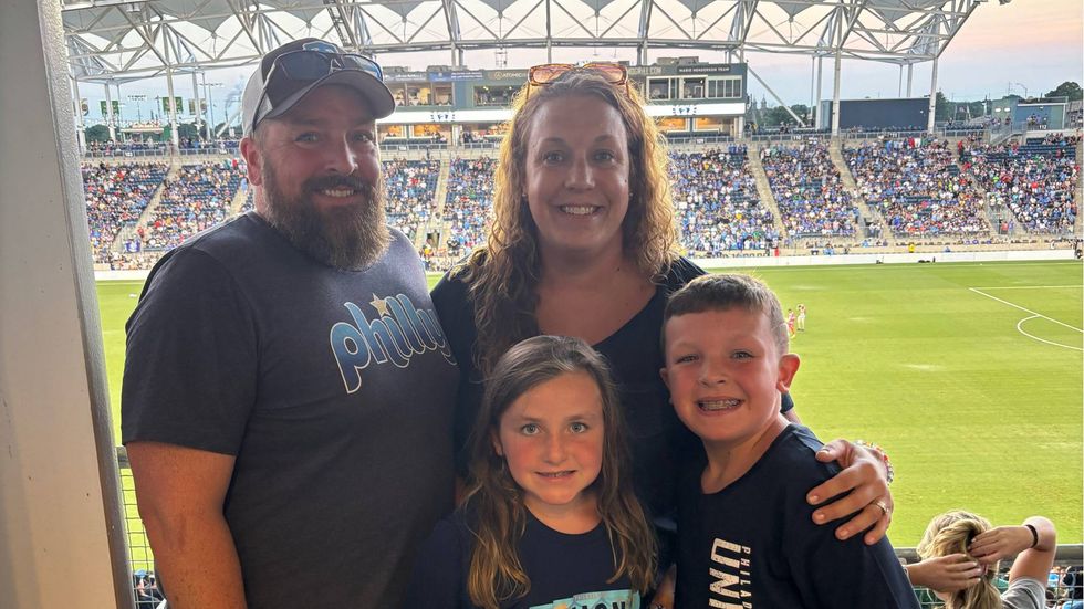 Jim Montgomery with his wife Abby and their kids Ella and Thatcher at Subaru Park