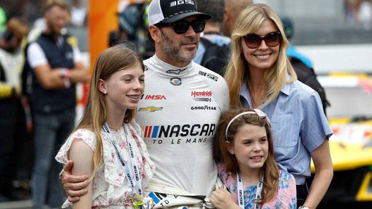 Jimmie Johnson of the #24 NASCAR Next Gen Chevrolet ZL1 looks on with his family during the 100th anniversary of the 24 Hours of Le Mans at the Circuit de la Sarthe June 10, 2023 in Le Mans, France. (Photo by Chris Graythen/Getty Images)