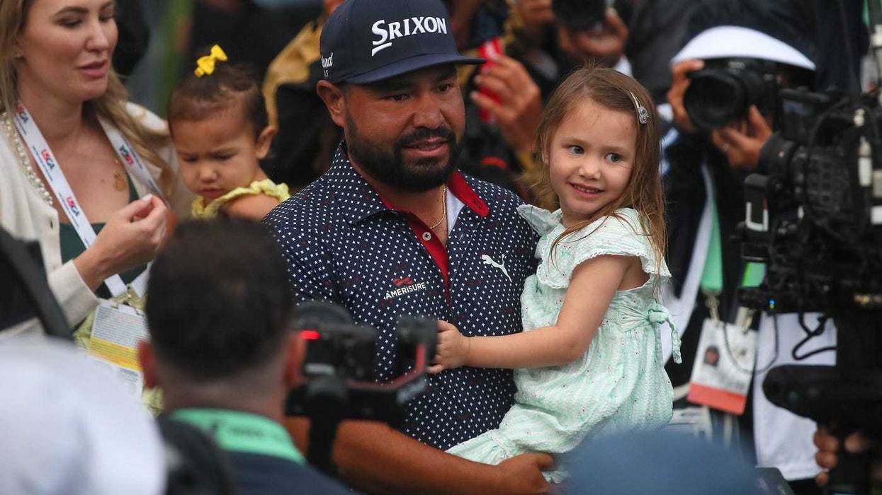 JJ Spaun with his daughter after winning US Open