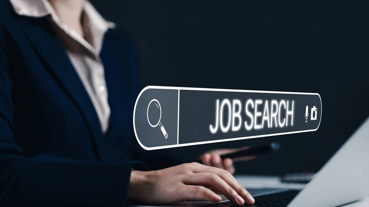 Job search and career opportunity concept. Businesswoman search for job opportunities on laptop with virtual search bar interface. online job hunting, career growth, and employment opportunities.