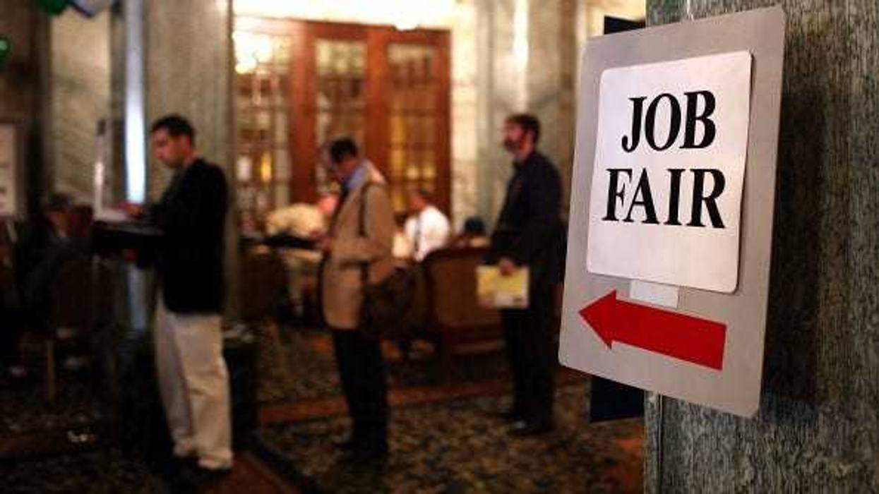 Job seekers wait in line to enter the San Francisco Hire Event job fair on November 9, 2011 in San Francisco, California. The national unemployment rate dipped this past month to 9 percent in October after employers added 80,000 jobs.