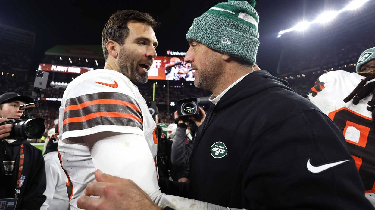 Joe Flacco and Aaron Rodgers hug after game