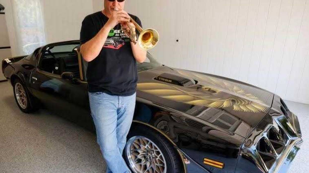 Joe Gransden and his restored 1979 Pontiac Firebird Trans Am