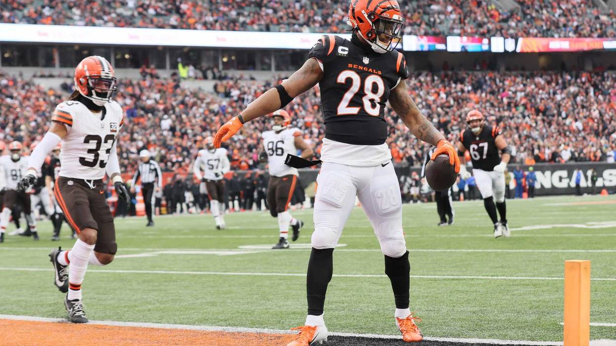 Joe Mixon #28 of the Cincinnati Bengals celebrates after a touchdown during the first quarter in the game against the Cleveland Browns at Paycor Stadium on January 07, 2024 in Cincinnati, Ohio.