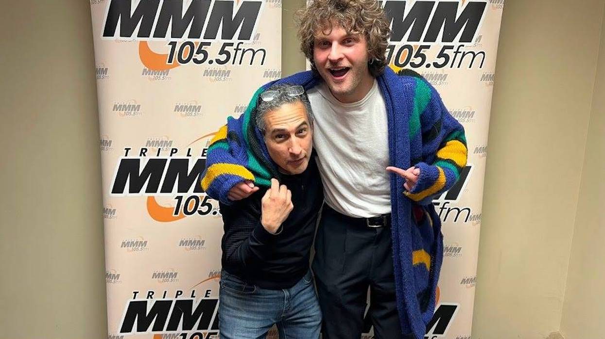 Joe P. in colorful sweater with Jonathan Suttin