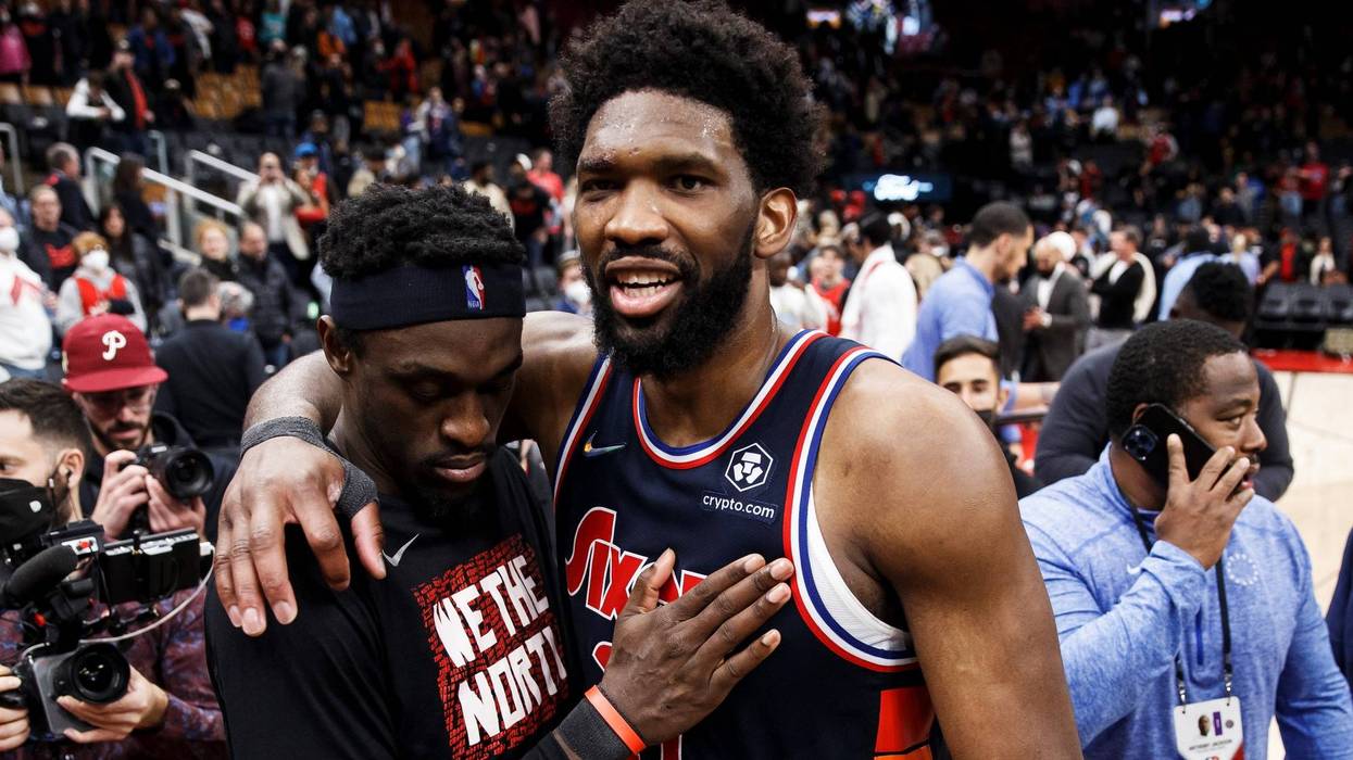 Joel Embiid of the Philadelphia 76ers and Pascal Siakam of the Toronto Raptors embrace after the 76ers' 132-97 win in Game Six of the Eastern Conference First Round at Scotiabank Arena on April 28, 2022 in Toronto, Canada.