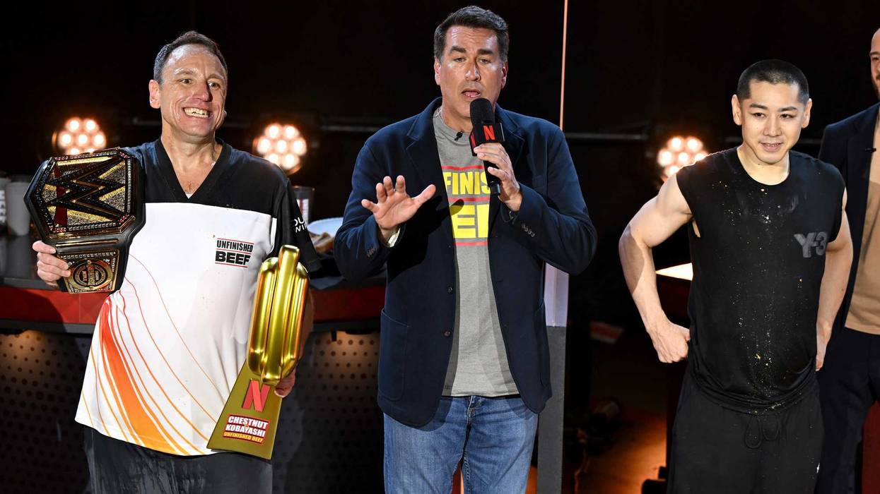 Joey Chestnut, Rob Riggle and Takeru Kobayashi speak onstage during LIVE Chestnut vs. Kobayashi: Unfinished Beef at the Hyper X Arena at the Luxor on Sept. 2, 2024 in Las Vegas, Nevada