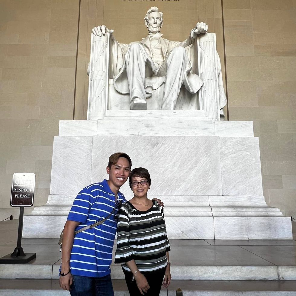 John Albert Laylo and his mother are shown at the Lincoln Memorial in Washington, D.C.