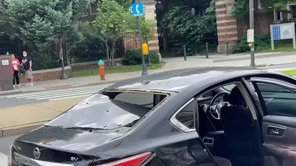 John Albert Laylo and his mother were in this Uber, on their way to Philadelphia International Airport early on June 18, when someone in a black car behind them opened fire.