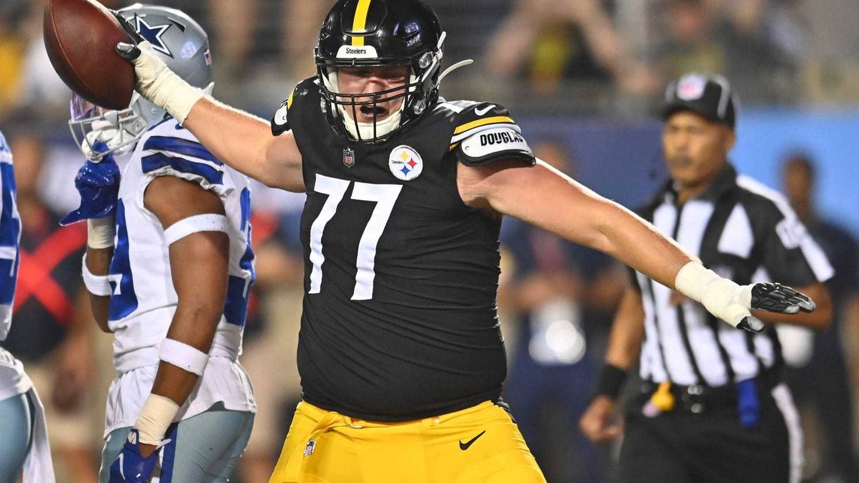 John Leglue spiking the football