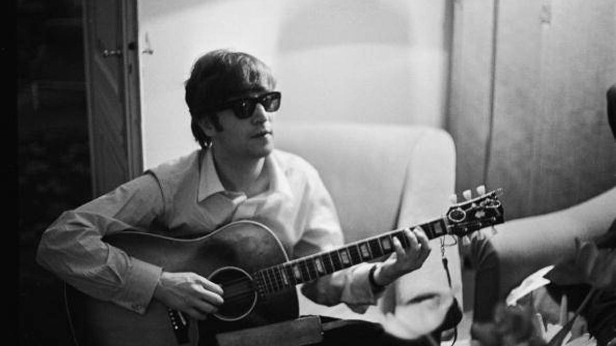 John Lennon with guitar