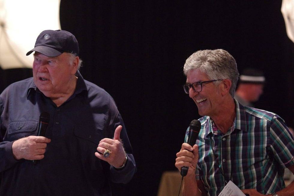John Madden and former KCBS Radio morning news anchor Stan Bunger share the stage at the 2015 Madden/KCBS Radio barbecue.