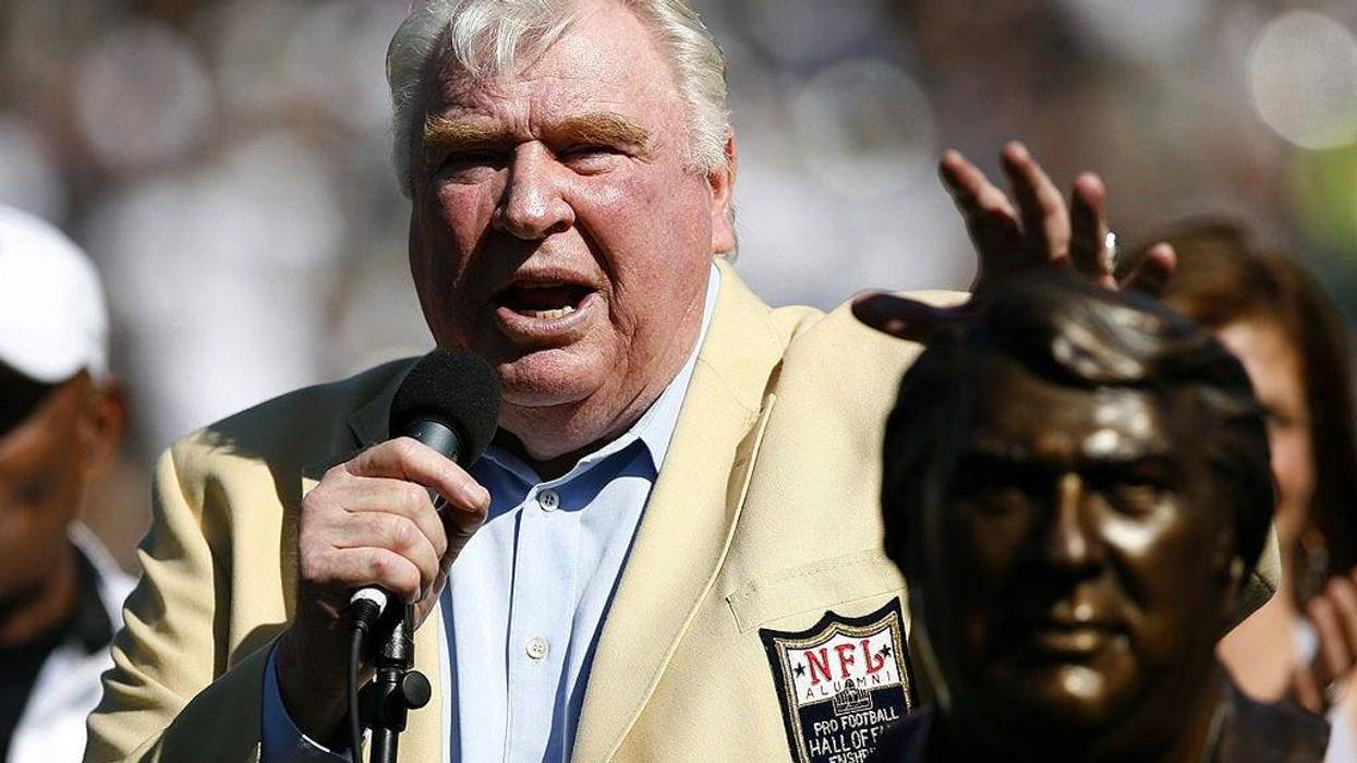 John Madden taps his bust during his Hall of Fame ceremony before the game as the Oakland Raiders defeated the Arizona Cardinals by a score of 22 to 9 at McAfee Coliseum, Oakland, California, October 22, 2006.