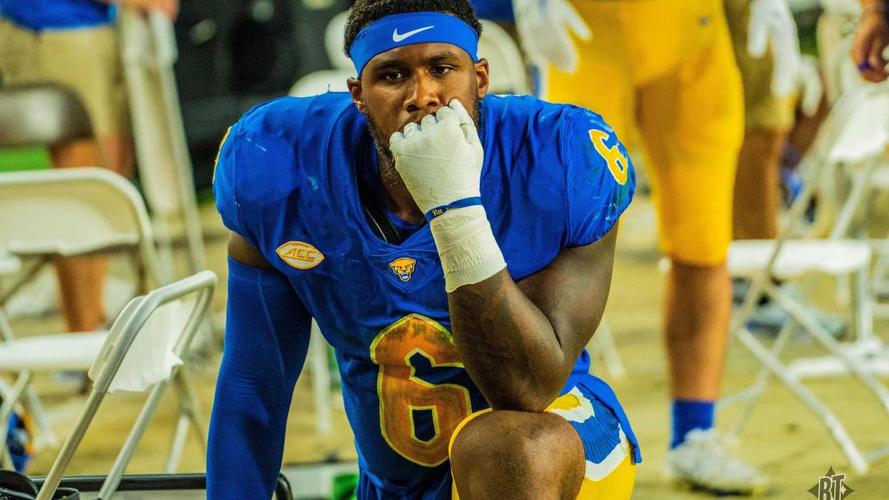 John Morning on one knee