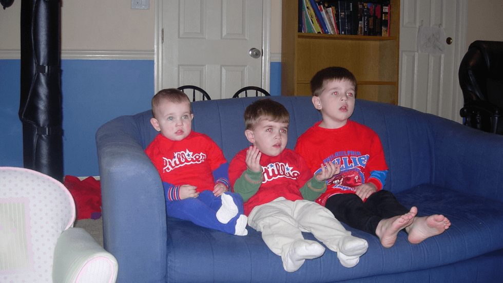 John Nolan III and his younger brother and sister watching the 2008 World Series.