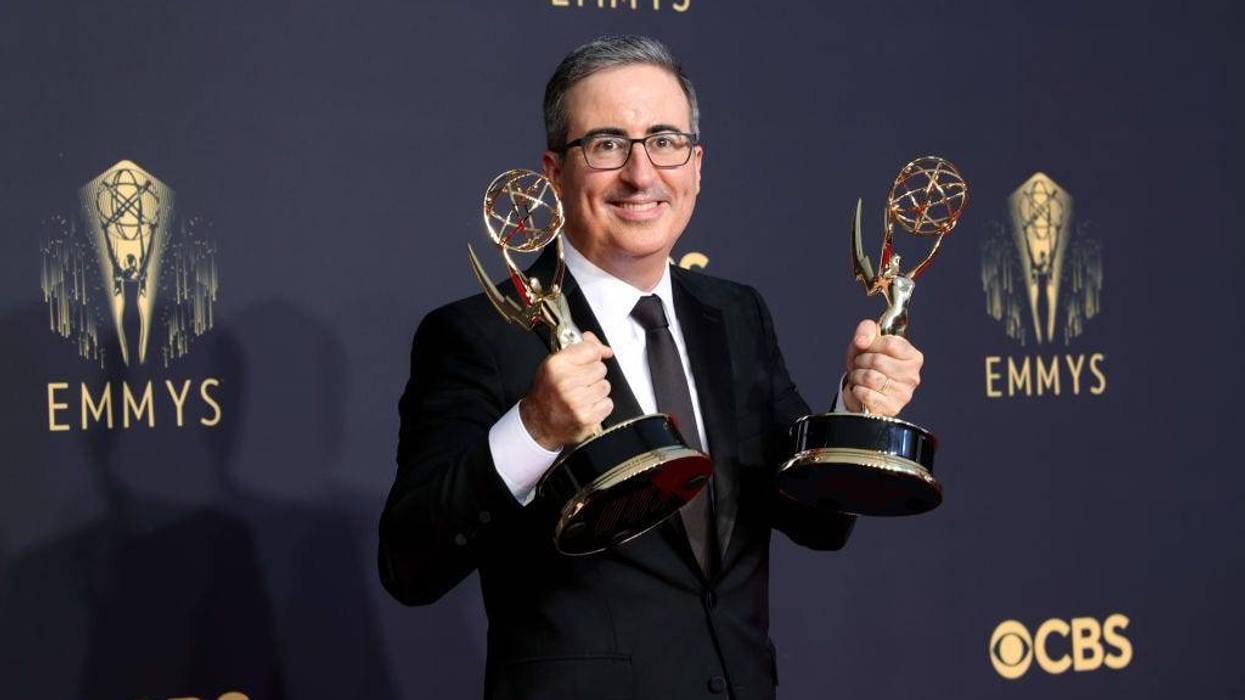 John Oliver, winner of the Outstanding Variety Talk Series and Outstanding Writing for a Variety Series awards for ‘Last Week Tonight with John Oliver,’ poses in the press room during the 73rd Primetime Emmy Awards at L.A. LIVE on September 19, 2021 in Los Angeles, California.