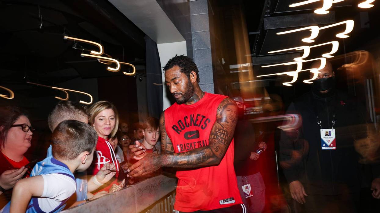 John Wall #1 of the Houston Rockets signs for fans prior to the Houston Rockets facing the Oklahoma City Thunder at Toyota Center on November 29, 2021 in Houston, Texas.