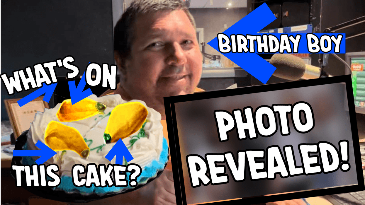 Johnny Lucas is pictured with arrows pointing at him, a birthday cake, and a blurred out photo. The text on the image says "Birthday Boy, What's on this cake? and Photo Revealed"