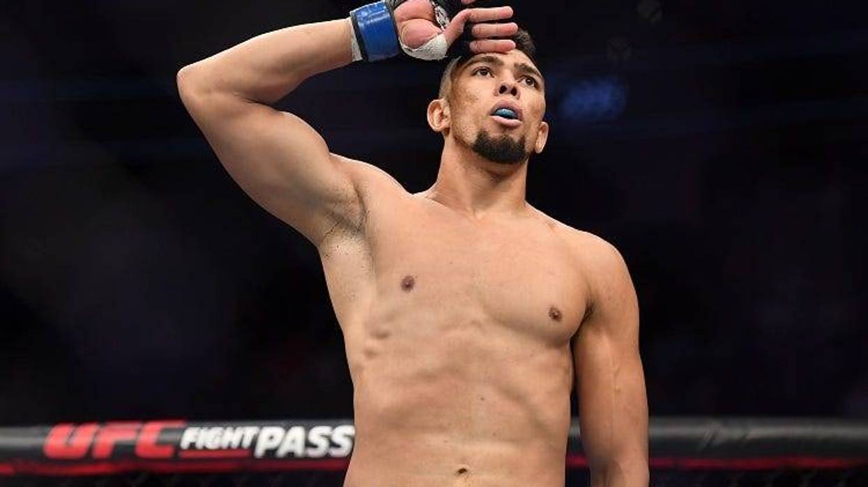 Johnny Walker (blue gloves) defeats Misha Cirkunov (red gloves) during UFC 235 at T-Mobile Arena.