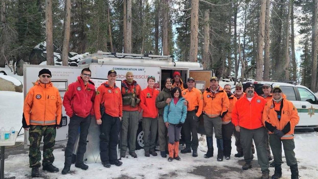 Jolly Bose with the search and rescue team that safely found her after she was missing for two days in the Sierra Mountains.