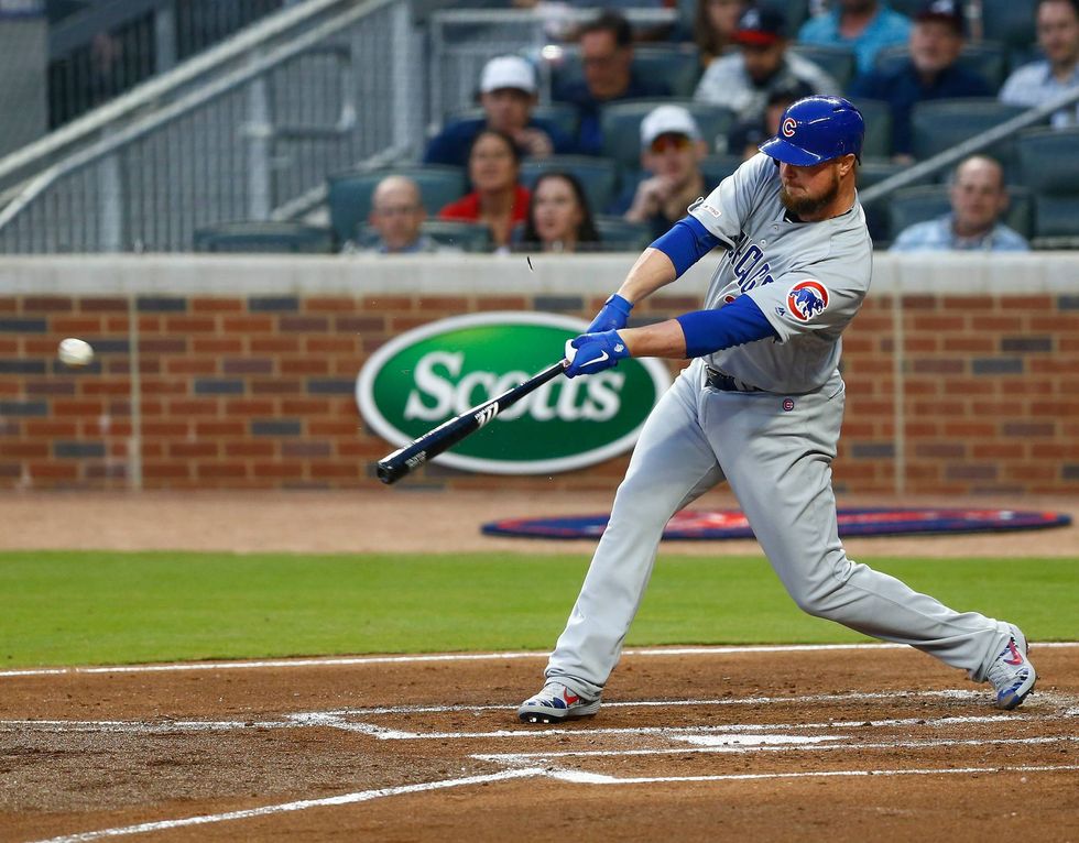 Jon Lester connecting on an RBI single