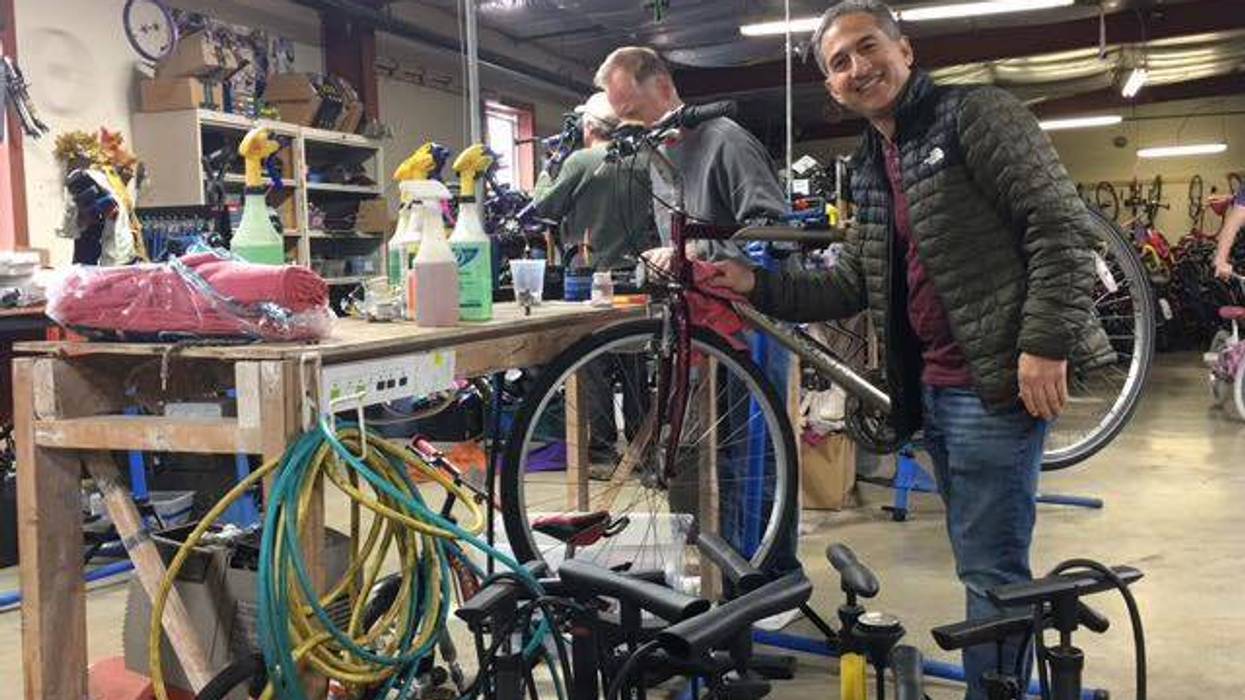 Jonathan spiffing up a bicycle