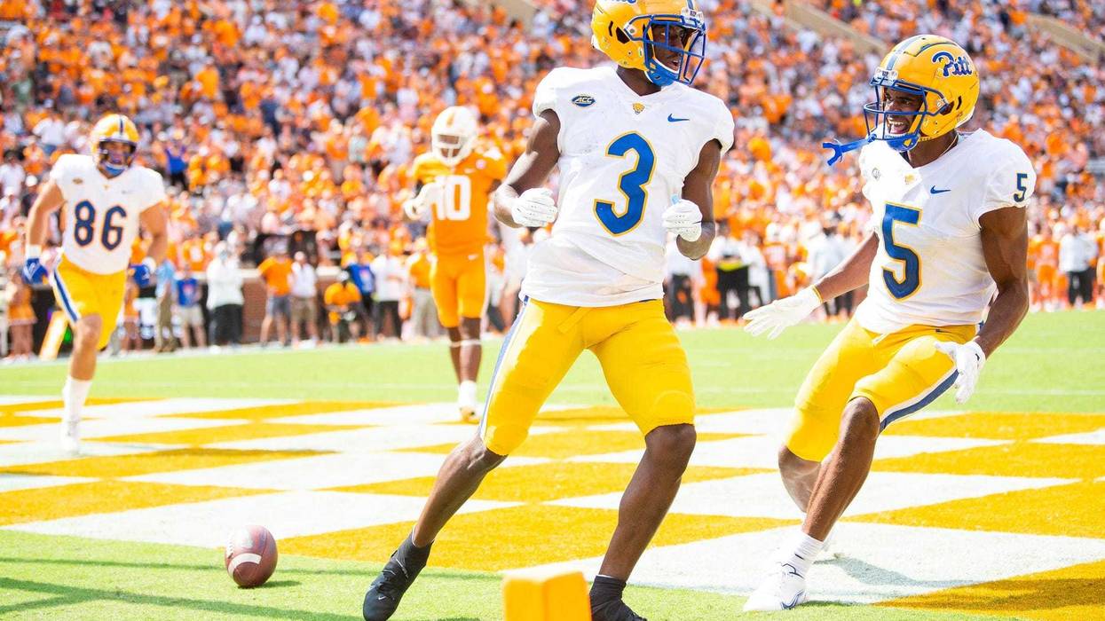 Jordan Addison after scoring with Jared Wayne in the background