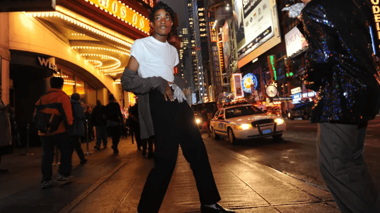 Jordan Neely, a longtime Michael Jackson impersonator, on his way to see the Michael Jackson movie "This is It" outside the Regal Cinemas in Times Square in 2009. A 24-year-old man choked Neely to death on the F train on Monday.