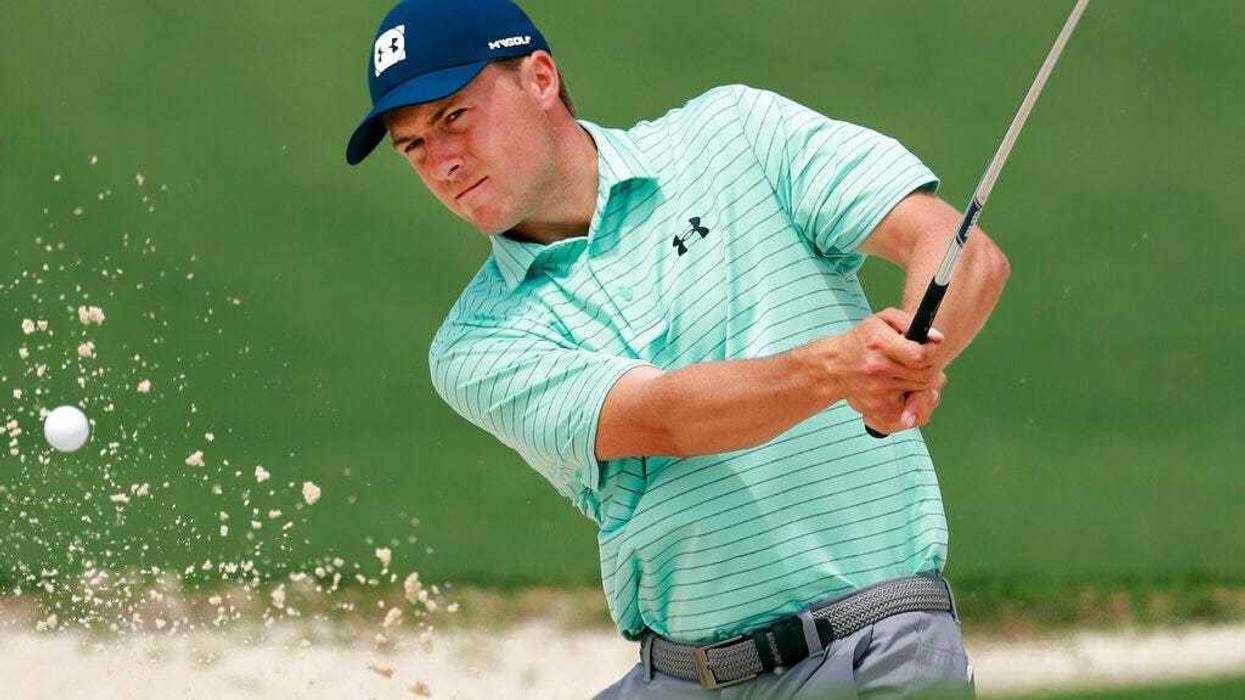 Jordan Spieth hits from the bunker to the second green during his practice round for the Masters at Augusta National Golf Club on Tuesday, April 9, 2019, in Augusta, Ga.