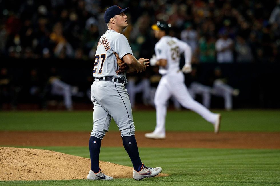 Jordan Zimmermann reacts to allowing a Matt Olsen home run