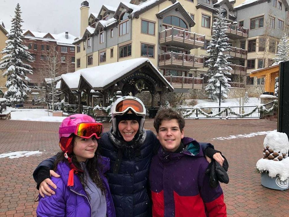 Jordana Green snowboarding with her children.