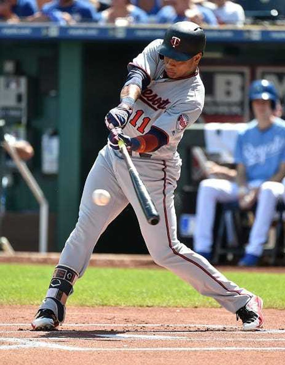 Jorge Polanco #11 of the Minnesota Twins singles in the first inning against the Kansas City Royals at Kauffman Stadium on September 16, 2018 in Kansas City, Missouri.
