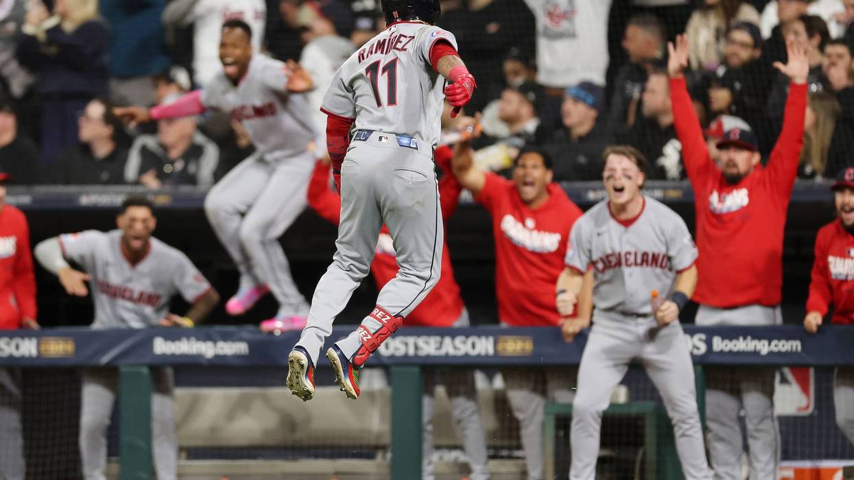 José Ramírez #11 of the Cleveland Guardians celebrates hitting a home run during the fifth inning against the Chicago White Sox in game four of the American League Division Series at Rate Field