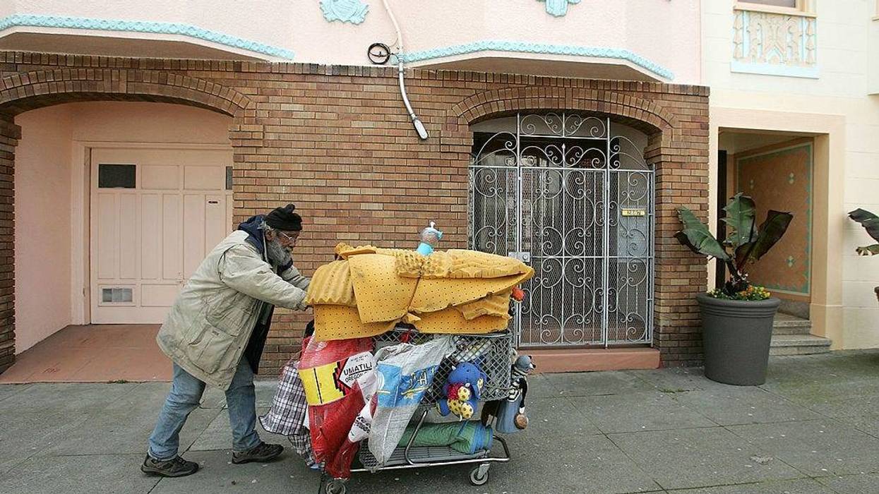 Joseph Cappa, a homeless person, pushes his shopping cart through a residential neighborhood February 28, 2007 in San Francisco, California.