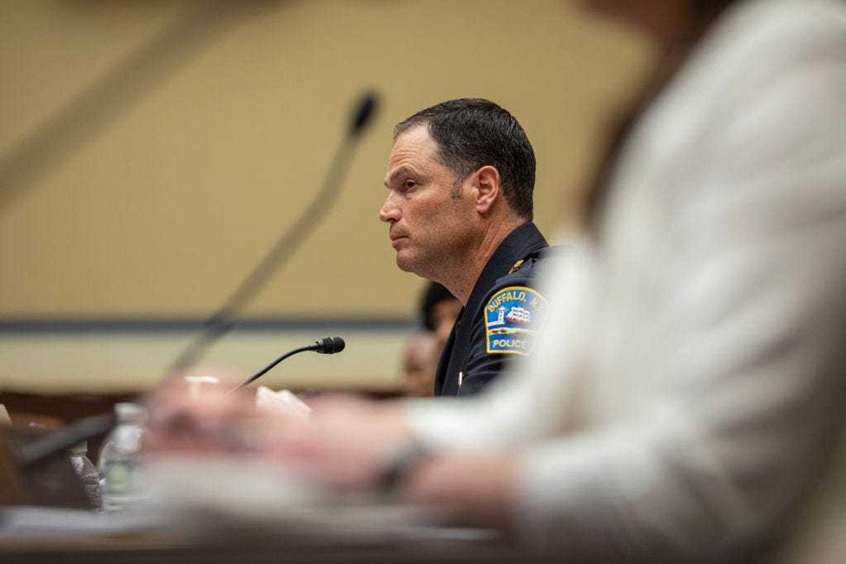 Joseph Gramaglia, Police Commissioner of Buffalo, New York, listens to Representative Clay Higgins, (R-LA) address him about gun violence during the House Oversight and Reform Committee hearing with victims' family members and survivors of the Buffalo, New York and Uvalde, Texas massacres on June 8, 2022 on Capitol Hill in Washington, DC. (Photo by Jason Andrew-Pool/Getty Images)