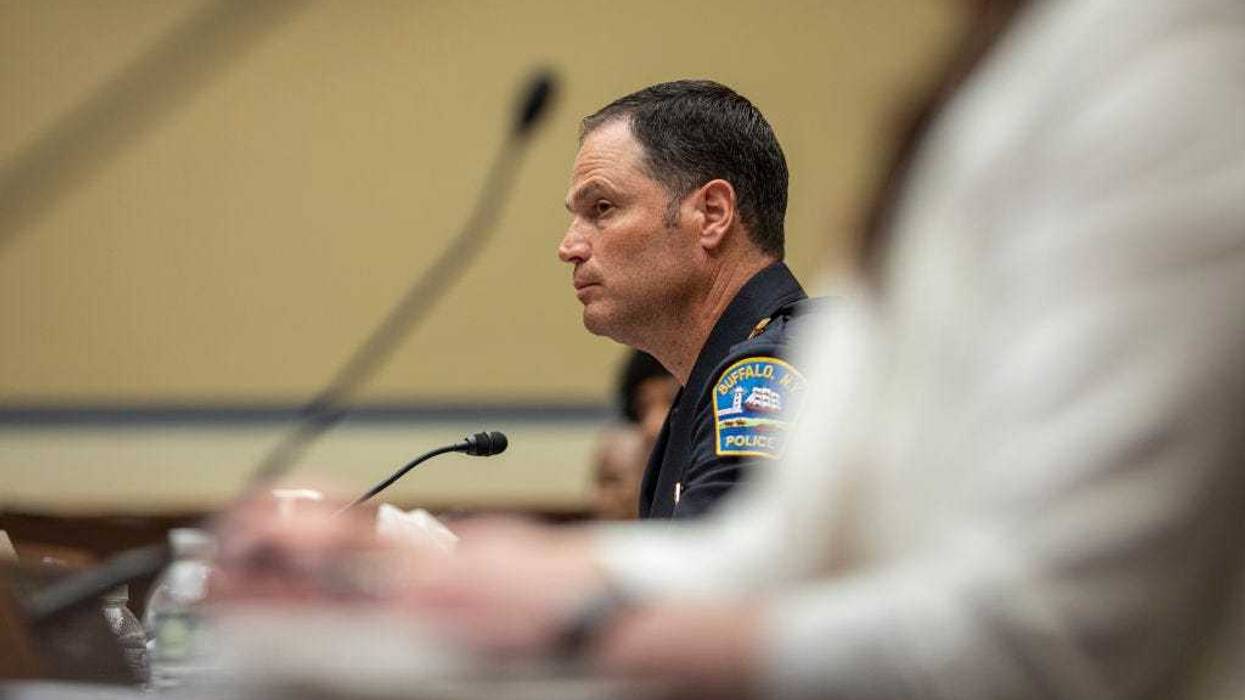 Joseph Gramaglia, Police Commissioner of Buffalo, New York, listens to Representative Clay Higgins, (R-LA) address him about gun violence during the House Oversight and Reform Committee hearing with victims' family members and survivors of the Buffalo, New York and Uvalde, Texas massacres on June 8, 2022 on Capitol Hill in Washington, DC. (Photo by Jason Andrew-Pool/Getty Images)