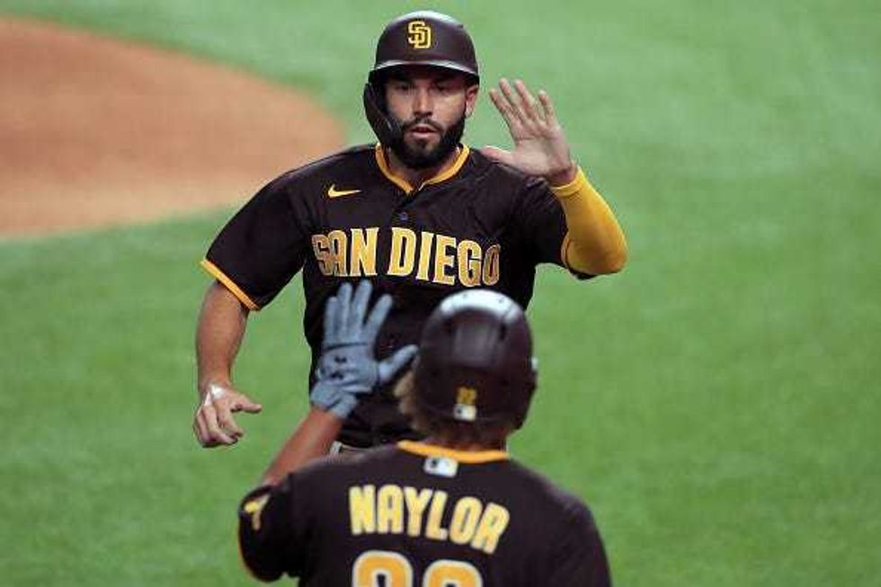 Josh Naylor celebrates with the Padres