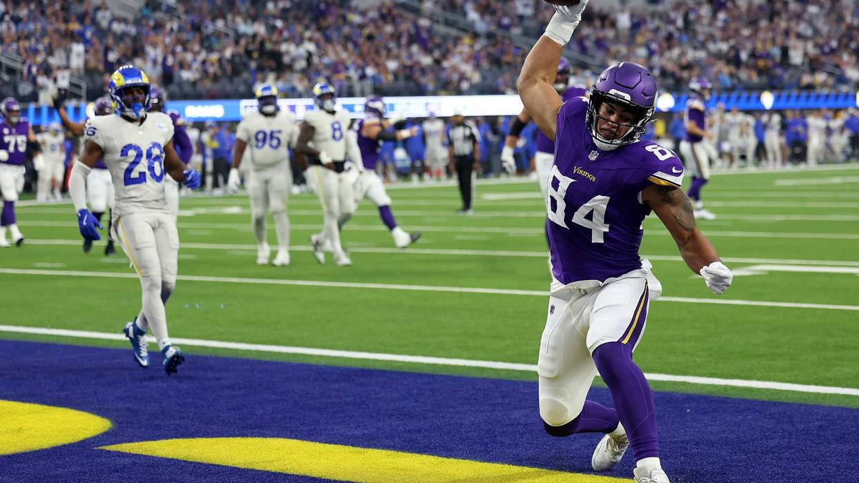 Josh Oliver #84 of the Minnesota Vikings celebrates a touchdown pass reception against the Los Angeles Rams in the first quarter at SoFi Stadium on October 24, 2024 in Inglewood, California.
