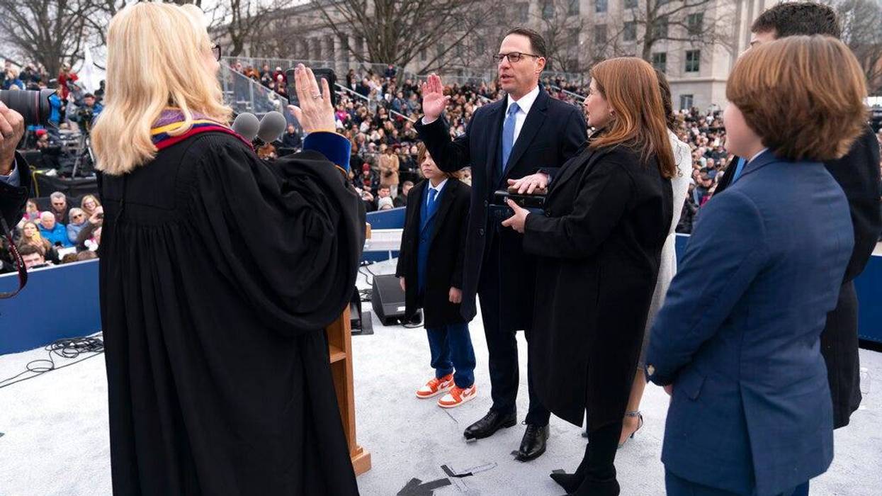 Josh Shapiro accompanied by his wife Lori Shapiro and children, takes the oath of office to become Pennsylvania's 48th governor, administered by Pennsylvania Supreme Court Chief Justice Debra Todd, Tuesday, Jan. 17, 2023, at the state Capitol in Harrisburg, Pa. (AP Photo/Matt Rourke)