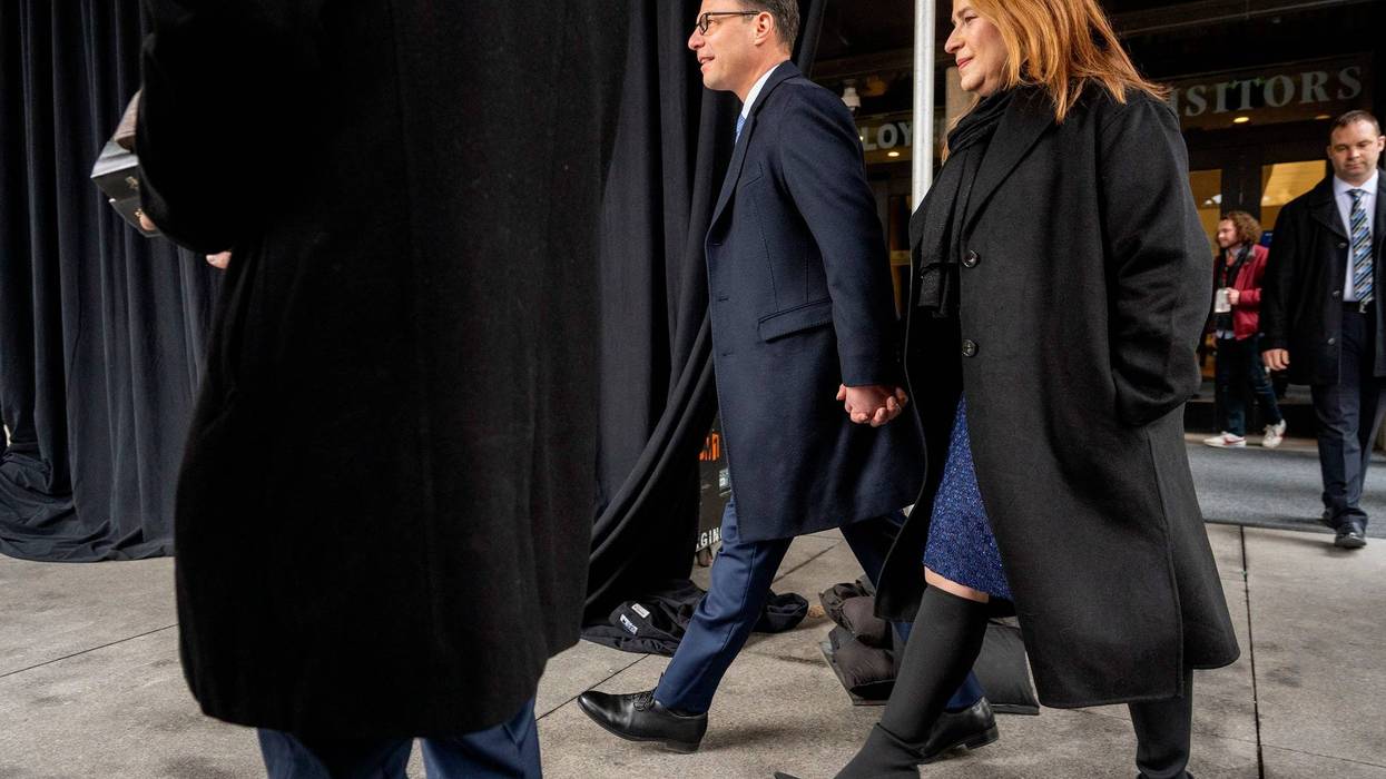 Josh Shapiro, who has hired close allies to advise him as governor, leaves the Capitol with his wife Lori before being sworn in.