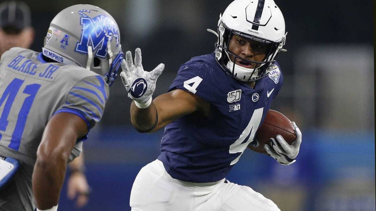 Journey Brown with stiff arm