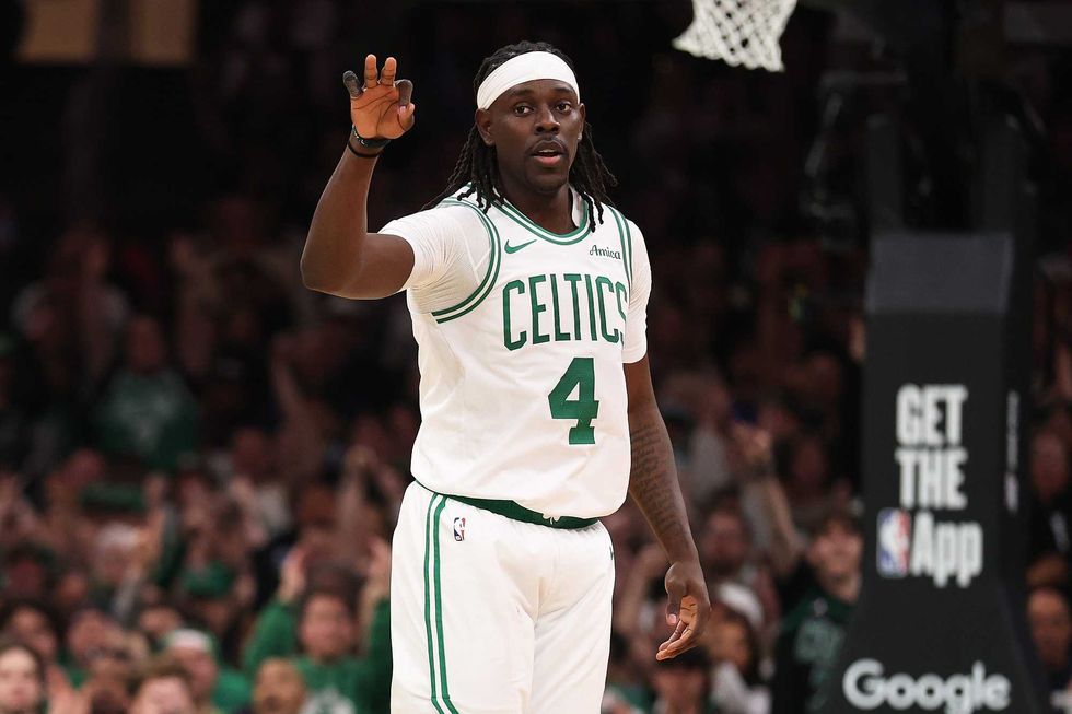Jrue Holiday #4 of the Boston Celtics reacts after a three point basket in Game One of the Eastern Conference First Round NBA Playoffs against the Orlando Magic at TD Garden on April 20, 2025 in Boston, Massachusetts.