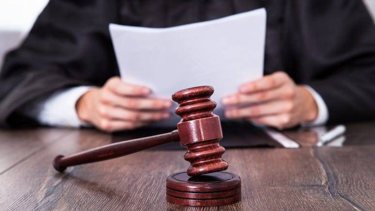 Judge holding documents